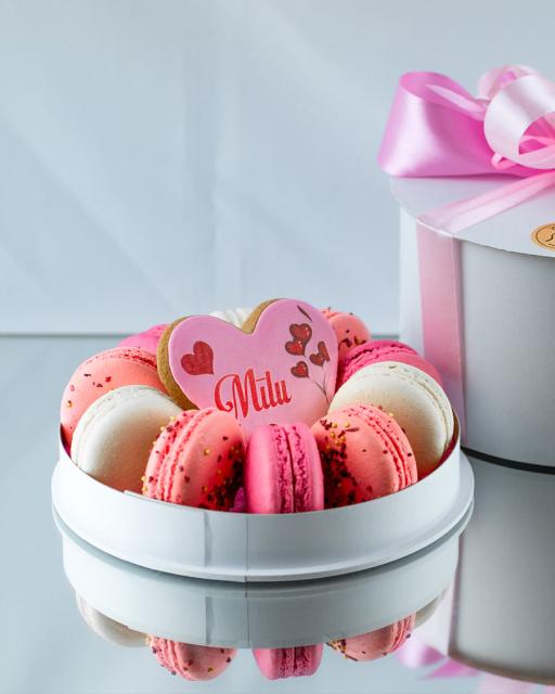 Romantical set of macarons and a heart-shaped cookie